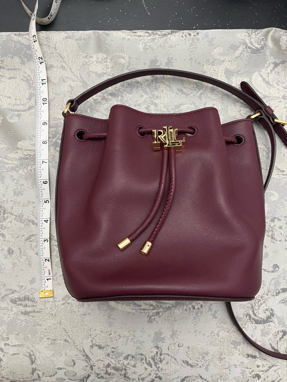 Ralph Lauren Burgundy Leather Drawstring Bucket Crossbody with Gold RL Logo